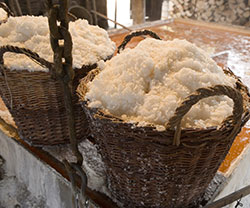 Baskets with salt at Læsø Saltsyderi Salt basin and salt in baskets at Læsø Saltsyderi