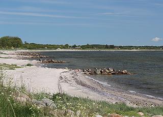 Sandy beach with small bays and shallow bathing water in the holiday home area Amtoft Sandy beach with small bays and shallow bathing water in the holiday home area Amtoft