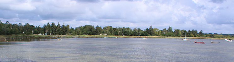Small boats on the clear water opposite the holiday home Atterup Small boats on the clear water opposite the holiday home Atterup