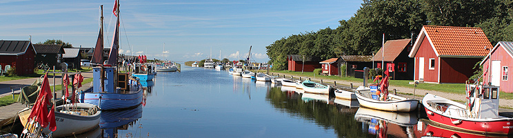 Den stemningsfulde havn med små huse i Stauning ved Ringkøbing Fjord Den stemningsfulde havn med små huse i Stauning ved Ringkøbing Fjord