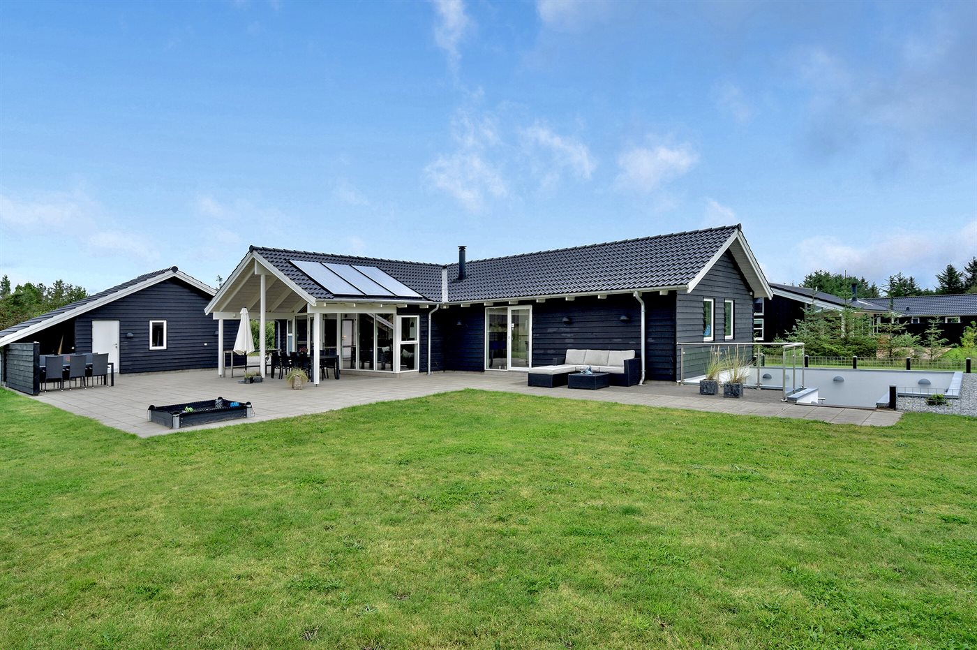 Ferienhaus mit umzäuntem Garten in Blokhus (Dänemark) und 3 Hunde erlaubt