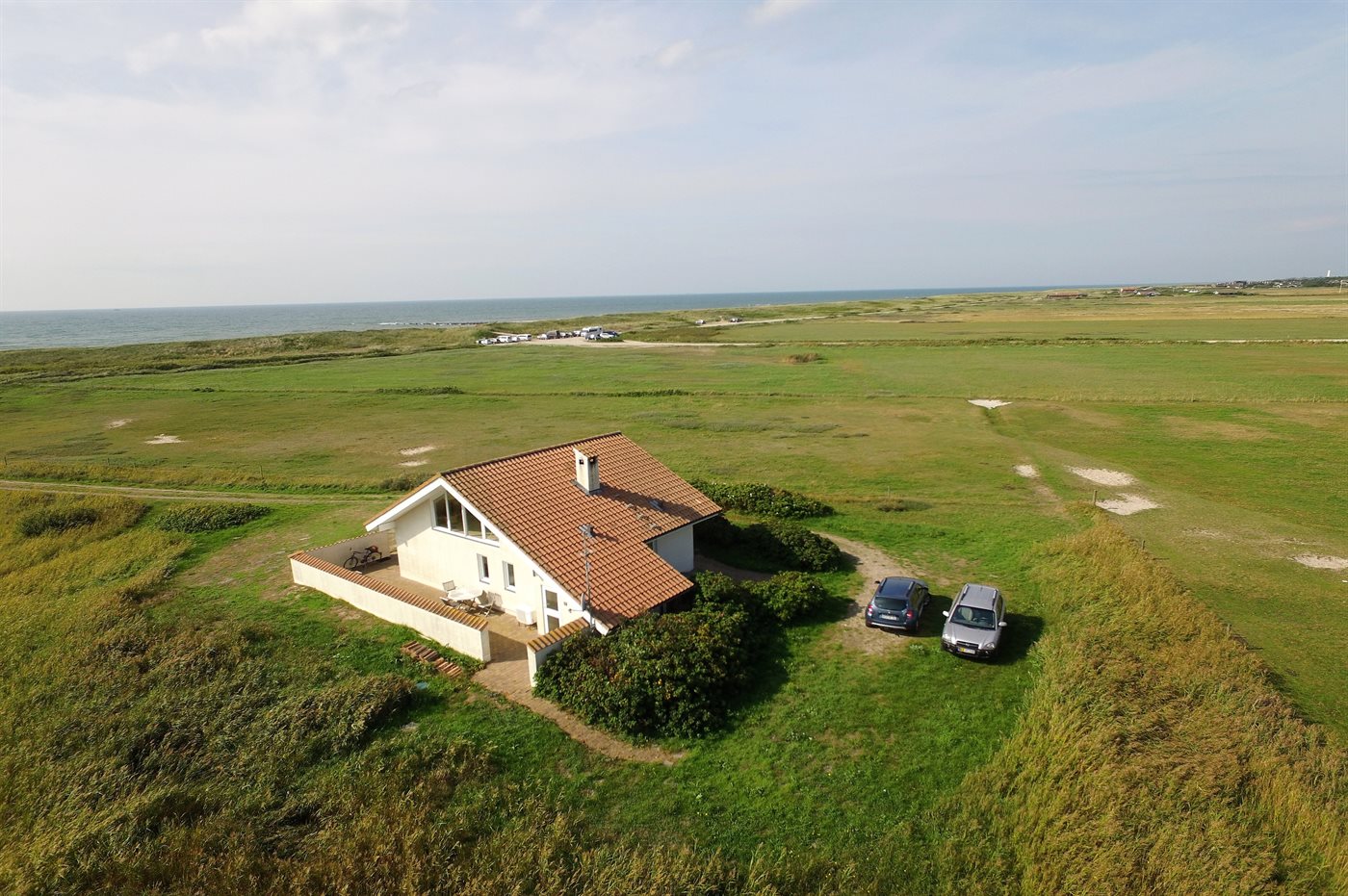 Dein Traumferienhaus in Blåvand: Sonne, Strand & Sauna!