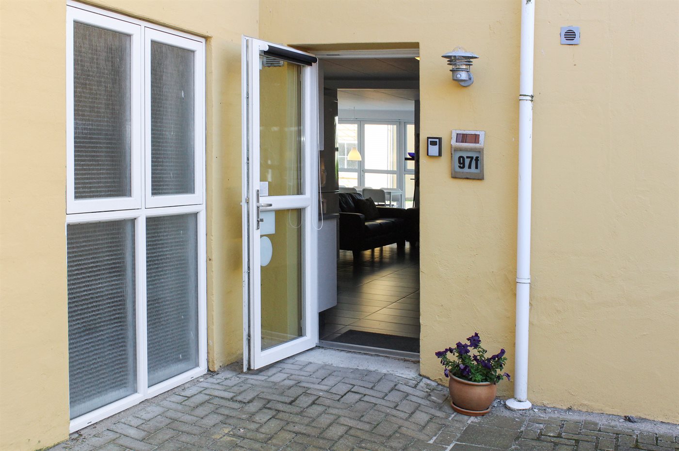Strandnahe Ferienwohnung mit Meerblick, Sauna & Kamin in Hou