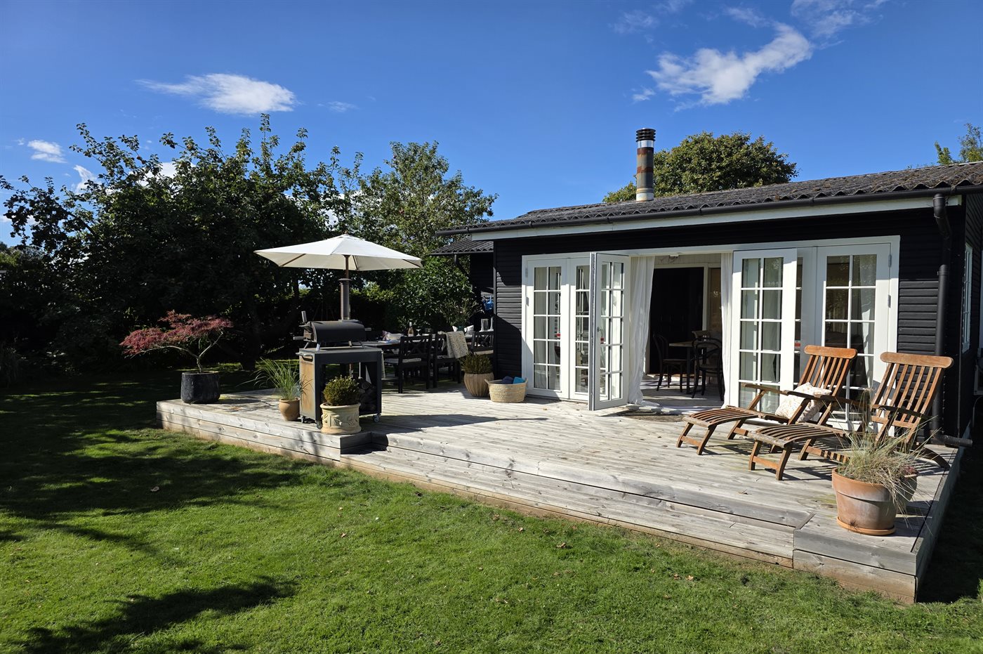 Gemütliches Ferienhaus mit Wintergarten & Hot Tub nahe Strand